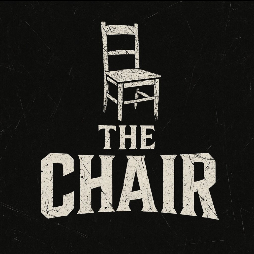 A white chair illustration above the words 'The Chair' on a black background.
