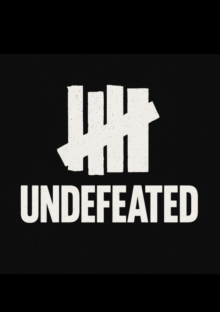 Undefeated logo with five tally marks on a black background.